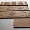 Керамогранит Mutina Бас-Релиеф Гарланд Релиеф Киприа / Bas-Relief Garland Relief Cipria матовый коричневый PUBG03 54х18 см